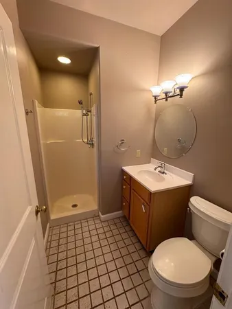 a view of a refrigerator in kitchen and wooden floor