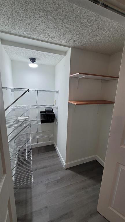 9273 Southwest 8th Street, Unit 109 Boca Raton, FL 33428 - Photo 9 of 20 a view of a walk in closet