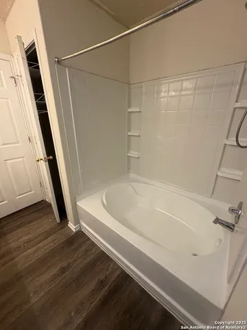 a bathroom with a bathtub