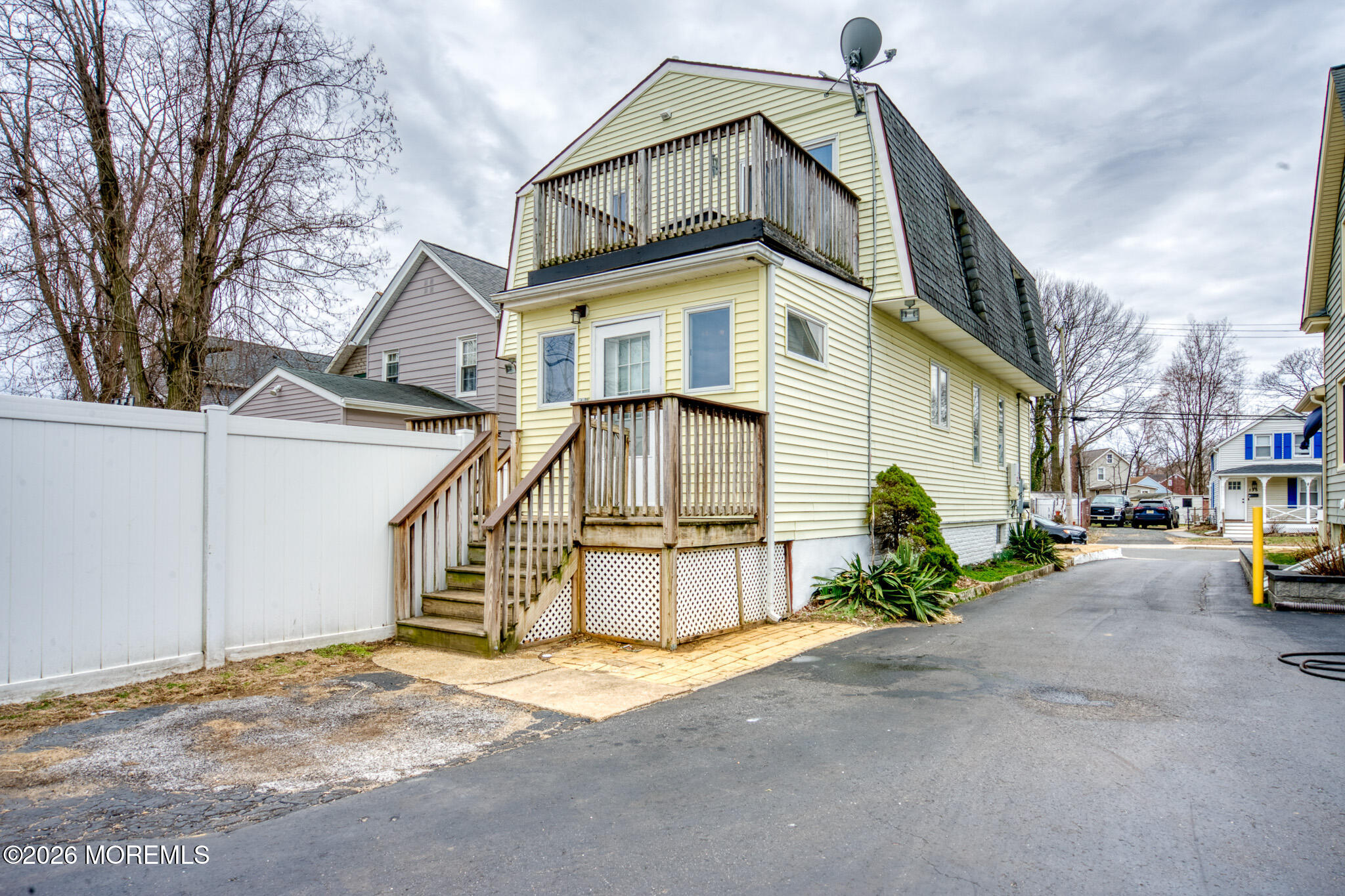 138 3rd Street Keyport, NJ 07735 - Photo 19 of 20 a front view of a house with a yard