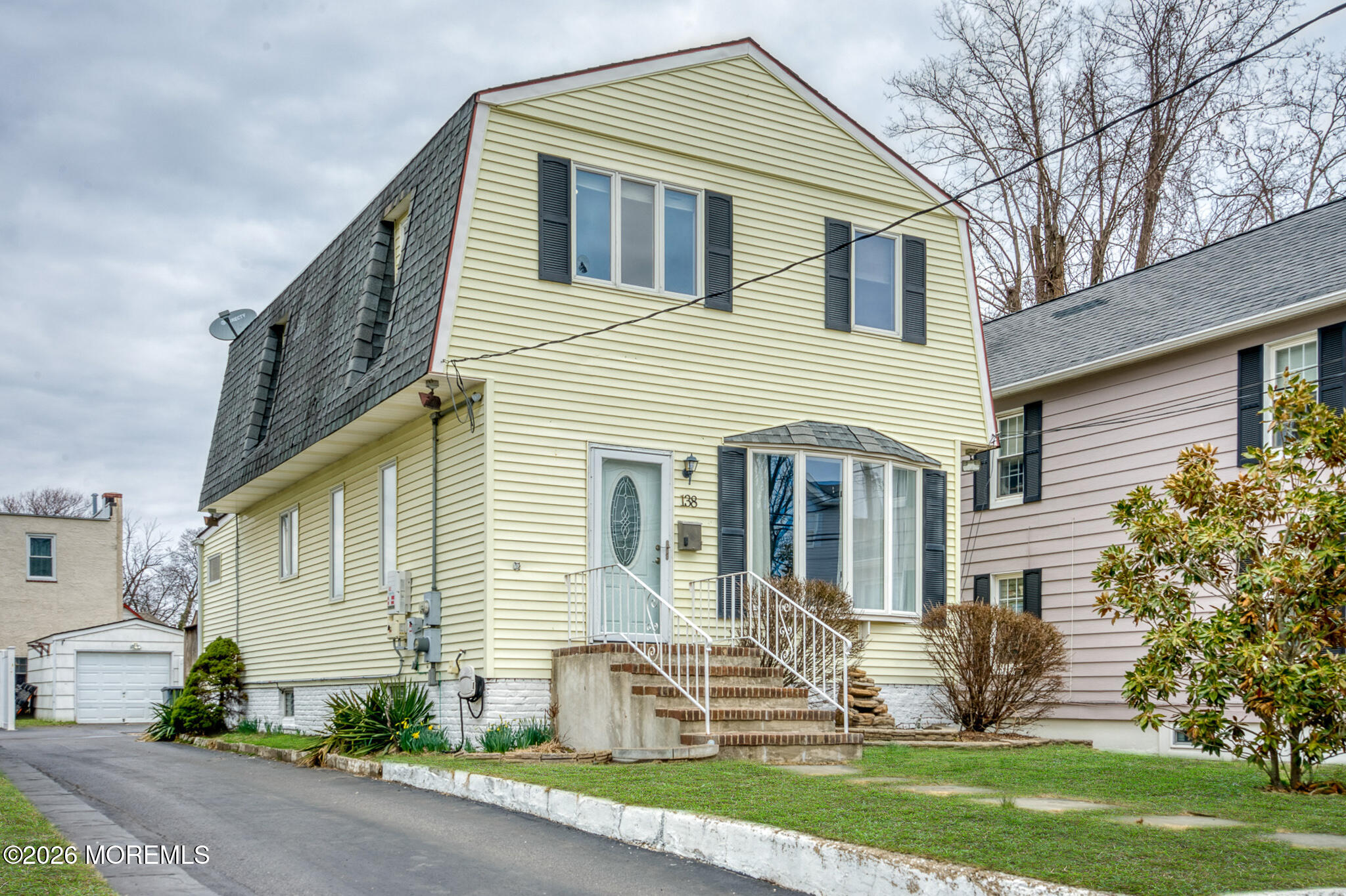 138 3rd Street Keyport, NJ 07735 - Photo 2 of 20 a front view of a house with garden