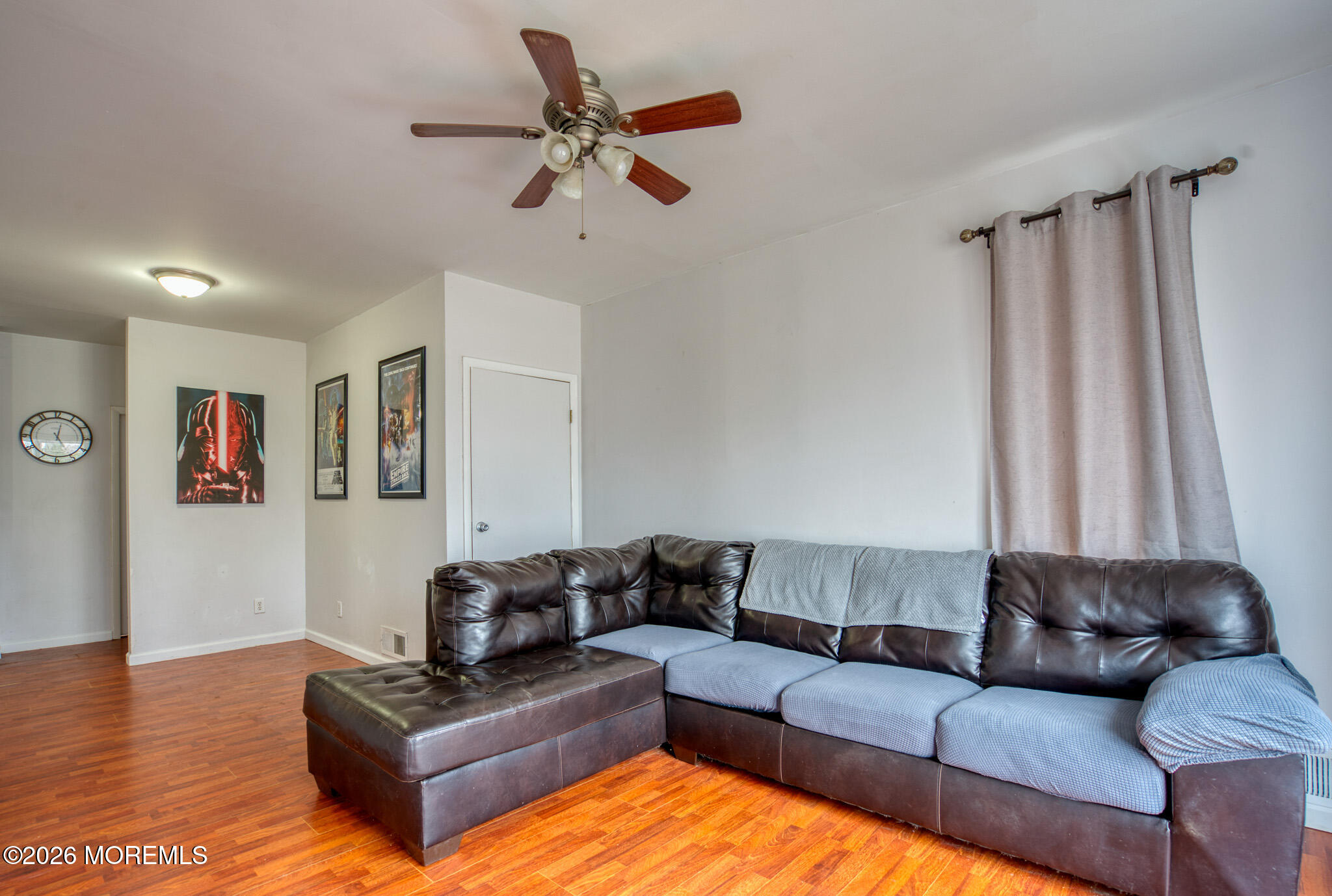 138 3rd Street Keyport, NJ 07735 - Photo 4 of 20 a living room with furniture and a wooden floor