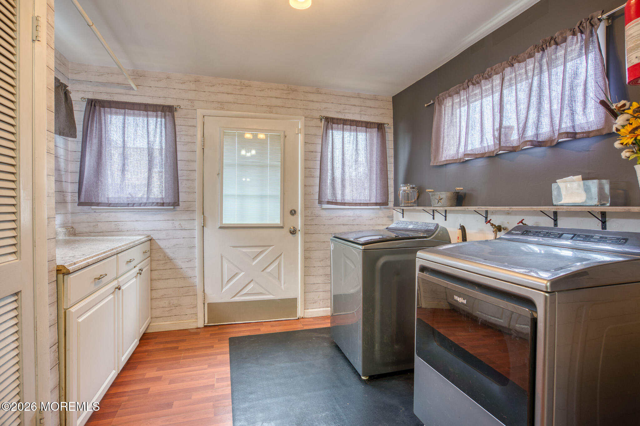 138 3rd Street Keyport, NJ 07735 - Photo 9 of 20 a kitchen with granite countertop a sink stove and cabinets