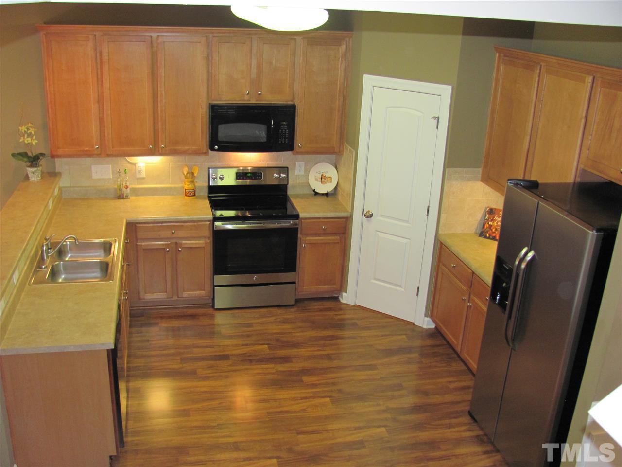 104 Leighann Ridge Lane Rolesville, NC 27571 - Photo 3 of 11 The spacious kitchen has many great features the family chef will be surely love! Lots of 42 inch Chestnut cabinets, plenty of counter space and even undermount lighting to shed some light on whats cooking!.