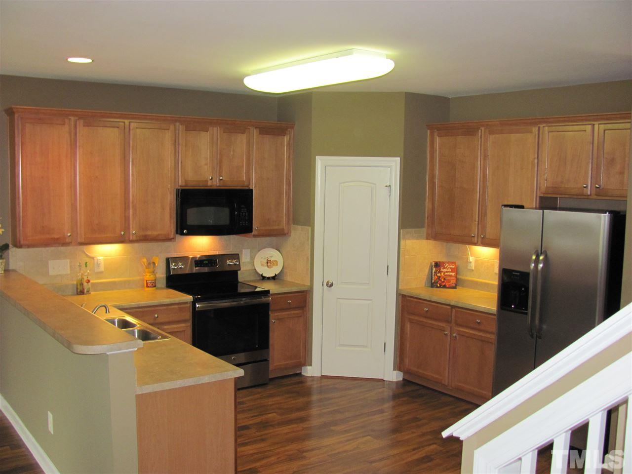 104 Leighann Ridge Lane Rolesville, NC 27571 - Photo 4 of 11 Another view of the beautiful kitchen area that also includes a large food pantry, a new stainless steel electric range and a new S.S. refrigerator which is included with the purchase of this great home.