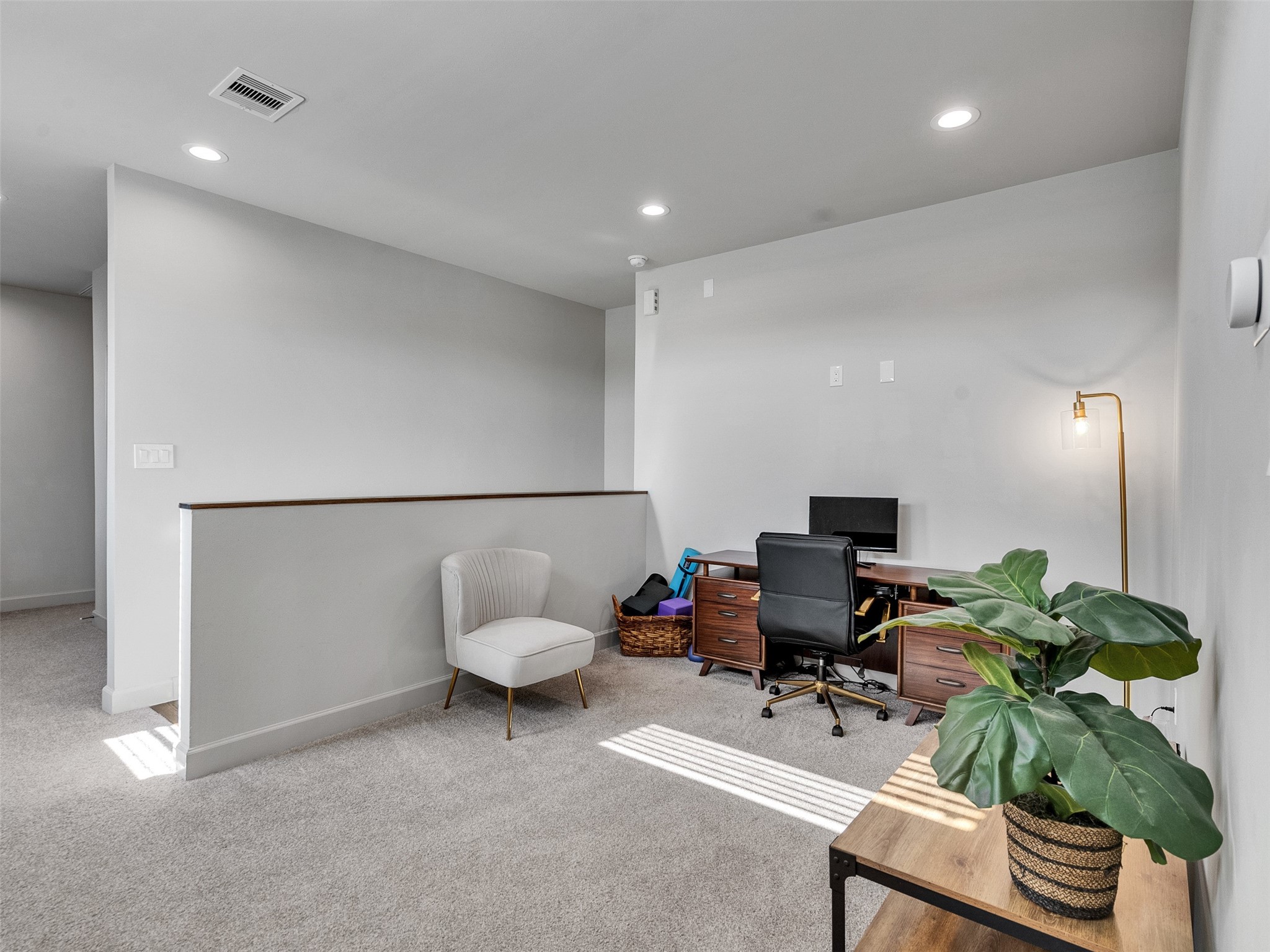 5702 Rucio Lane Houston, TX 77092 - Photo 18 of 30 a living room with furniture and a potted plant