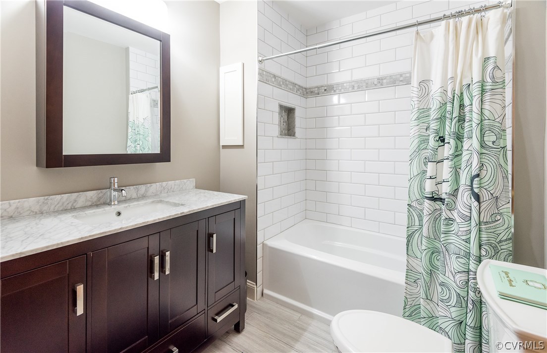 8414 Rubimont Road Richmond, VA 23235 - Photo 16 of 43 Hall bath, marble topped vanity. Ceramic tiled flo