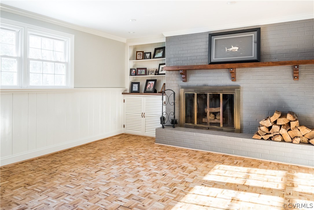 8414 Rubimont Road Richmond, VA 23235 - Photo 29 of 43 Lower level family room with parquet floor and woo