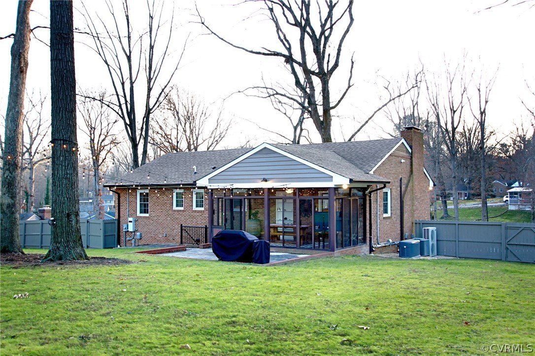 8414 Rubimont Road Richmond, VA 23235 - Photo 35 of 43 View of florida room, patio and generator.