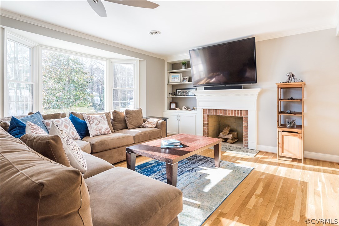 8414 Rubimont Road Richmond, VA 23235 - Photo 10 of 43 Light filled living room with bay window, fireplac