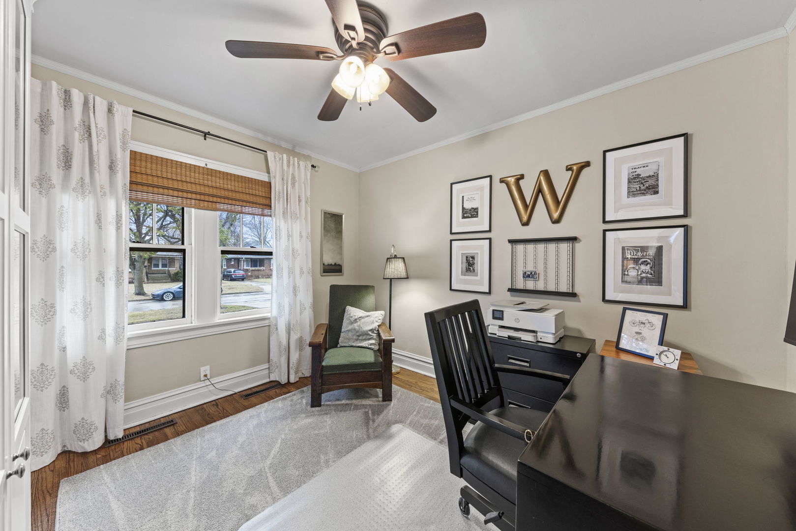 909 Webster Avenue Wheaton, IL 60187 - Photo 11 of 27 a view of a workspace with furniture and a window