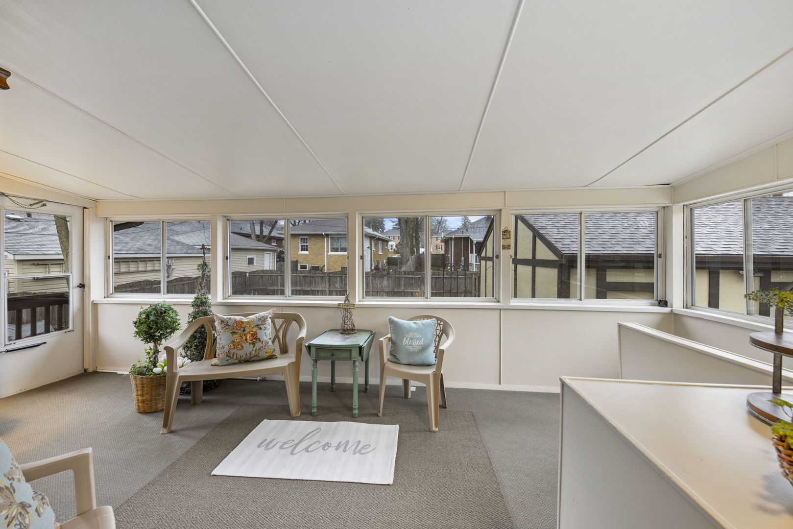 909 Webster Avenue Wheaton, IL 60187 - Photo 18 of 27 a living room with furniture and a large window