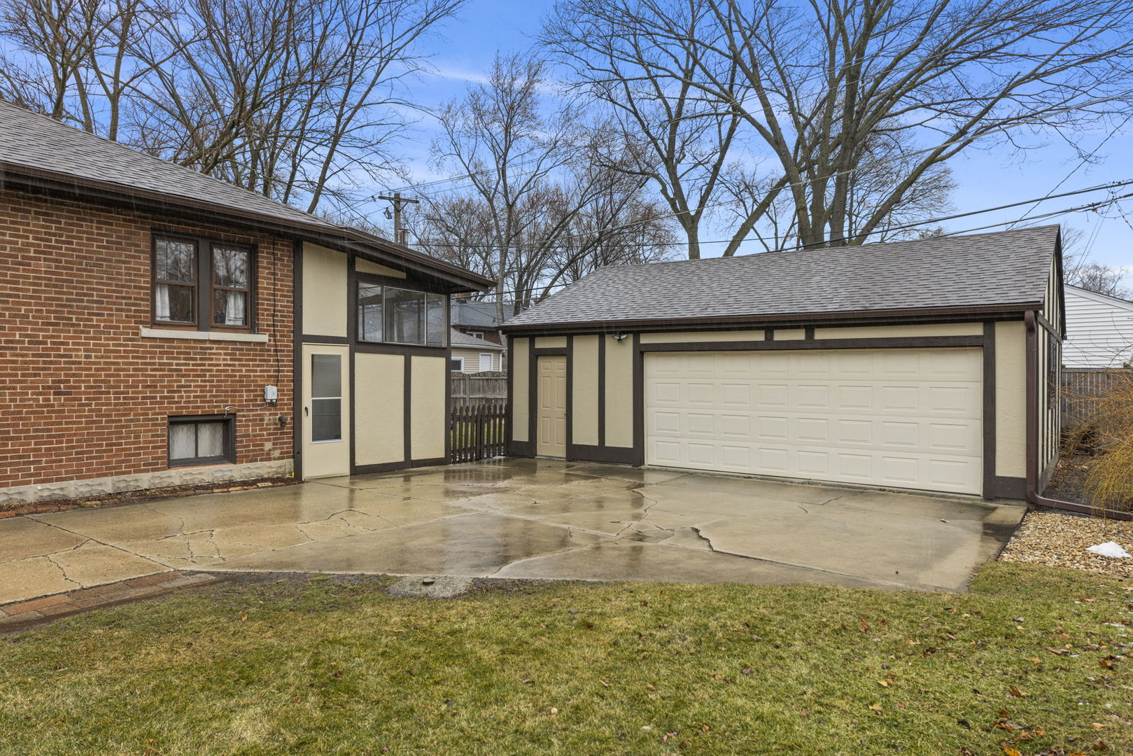 909 Webster Avenue Wheaton, IL 60187 - Photo 19 of 27 a front view of a house with a yard