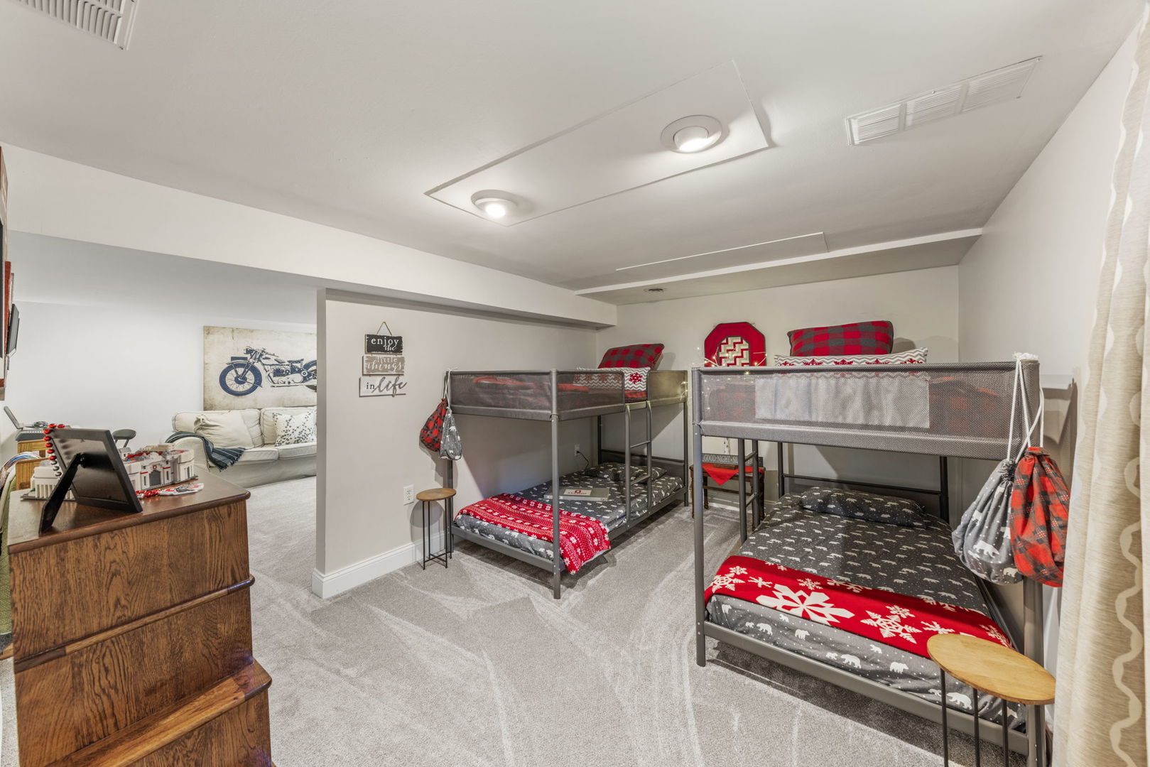 909 Webster Avenue Wheaton, IL 60187 - Photo 23 of 27 a living room with furniture and a flat screen tv