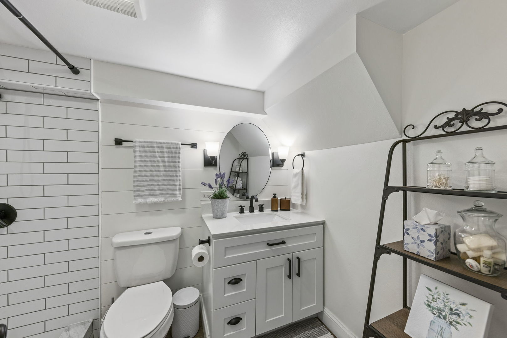 909 Webster Avenue Wheaton, IL 60187 - Photo 26 of 27 a bathroom with a toilet sink vanity granite and mirror