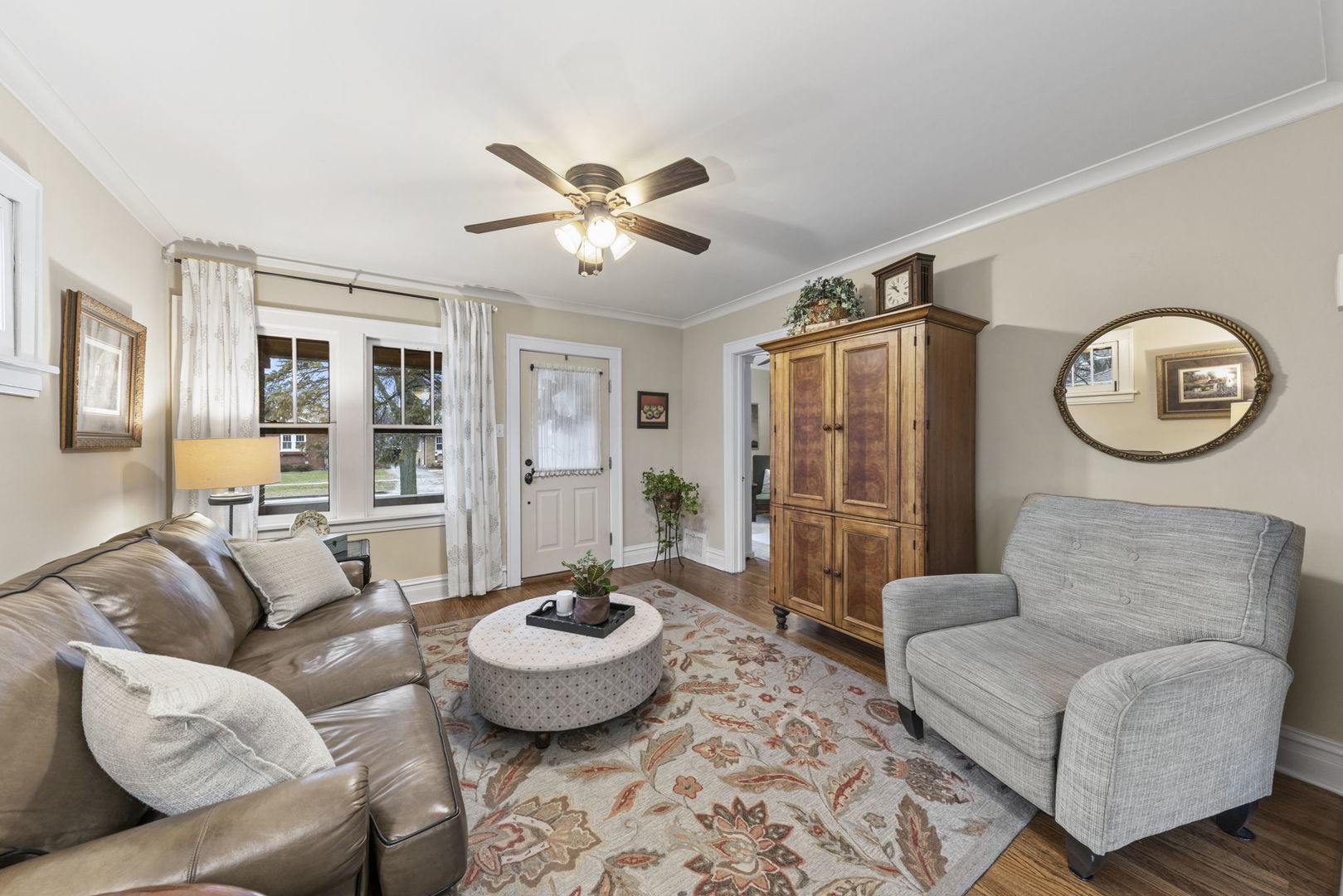 909 Webster Avenue Wheaton, IL 60187 - Photo 5 of 27 a living room with furniture and a large window