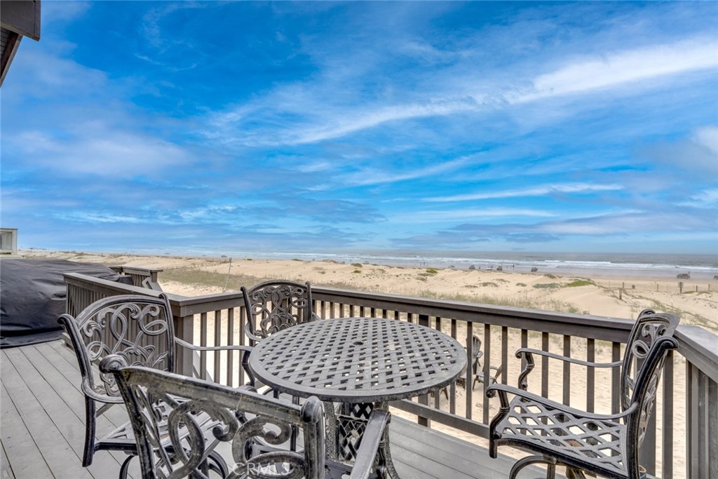 1612 Strand Way Oceano, CA 93445 - Photo 16 of 27 a view of a balcony with wooden floor