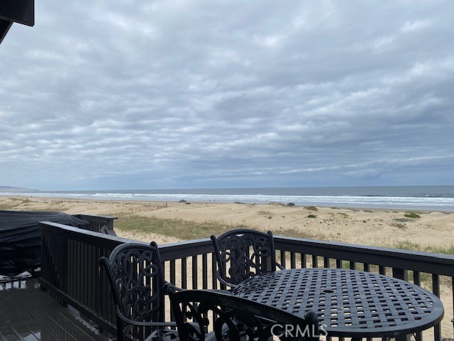 1612 Strand Way Oceano, CA 93445 - Photo 18 of 27 a view of roof deck with wooden floor and fence