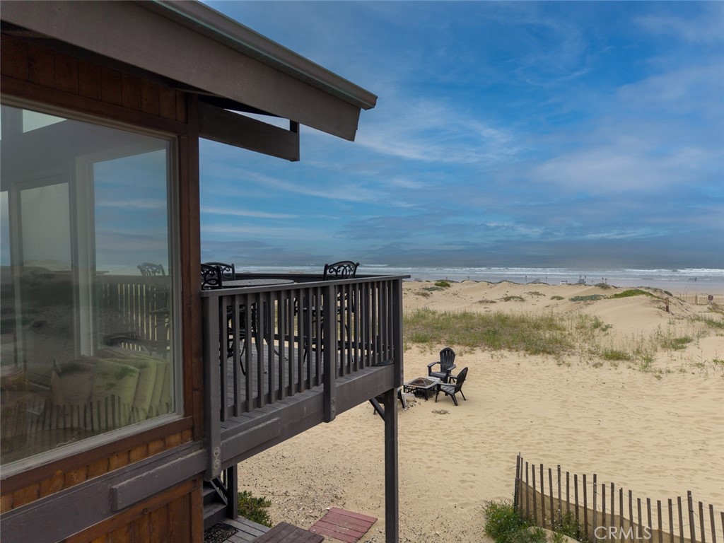 1612 Strand Way Oceano, CA 93445 - Photo 23 of 27 a view of a balcony with a ocean view