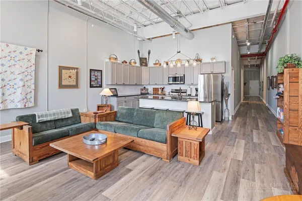 a living room with furniture and a window
