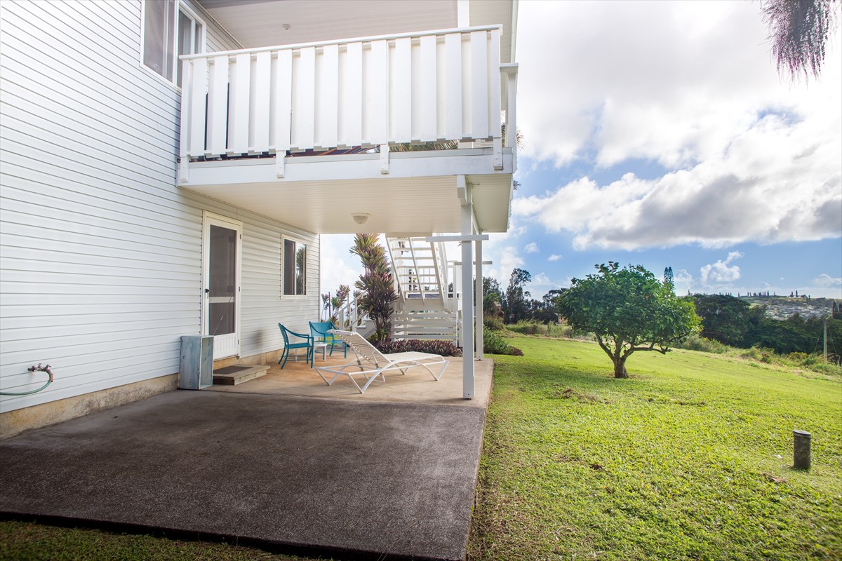 5001 Kikala Road, Unit 1 Kalaheo, HI 96741 - Photo 12 of 14 a view of a garden with a bench