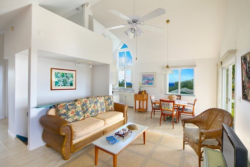 5001 Kikala Road, Unit 1 Kalaheo, HI 96741 - Photo 2 of 14 a living room with furniture and a window