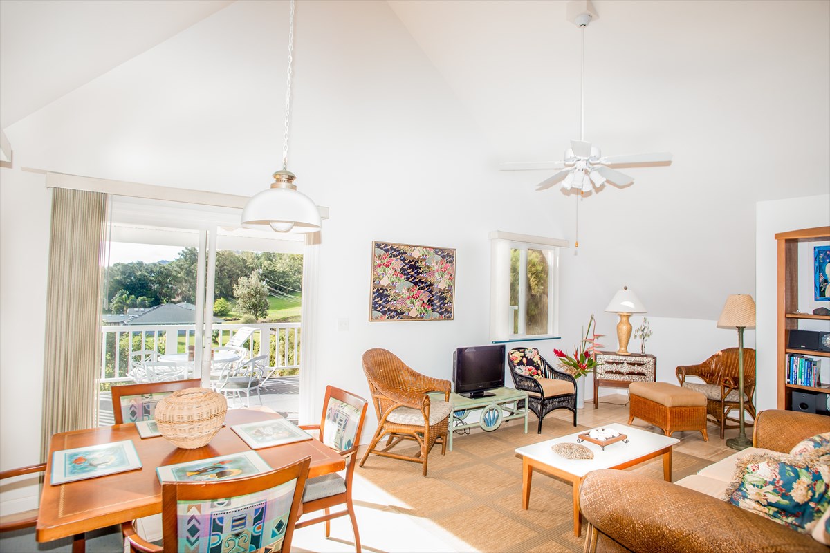 5001 Kikala Road, Unit 1 Kalaheo, HI 96741 - Photo 5 of 14 a living room with furniture and a large window