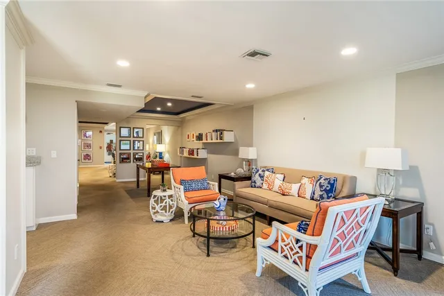 a living room with furniture and a table