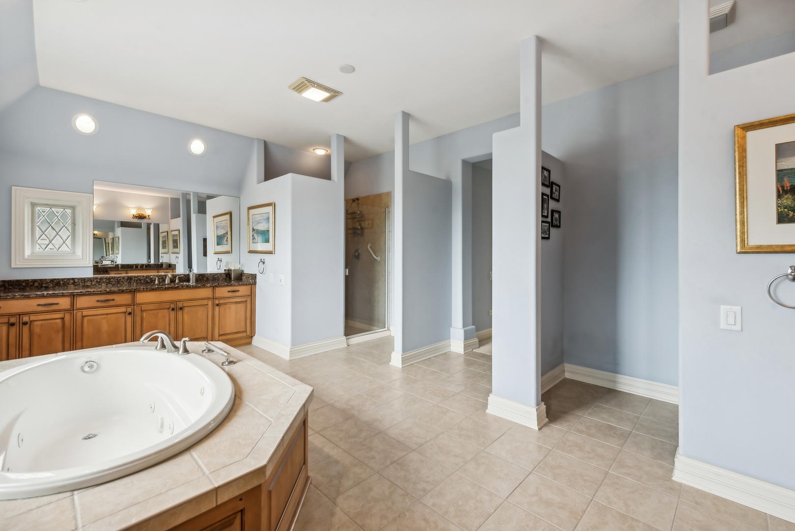 9 Willowcrest Drive, Unit 9 Oak Brook, IL 60523 - Photo 25 of 37 a living room with stainless steel appliances kitchen island granite countertop a refrigerator and a sink