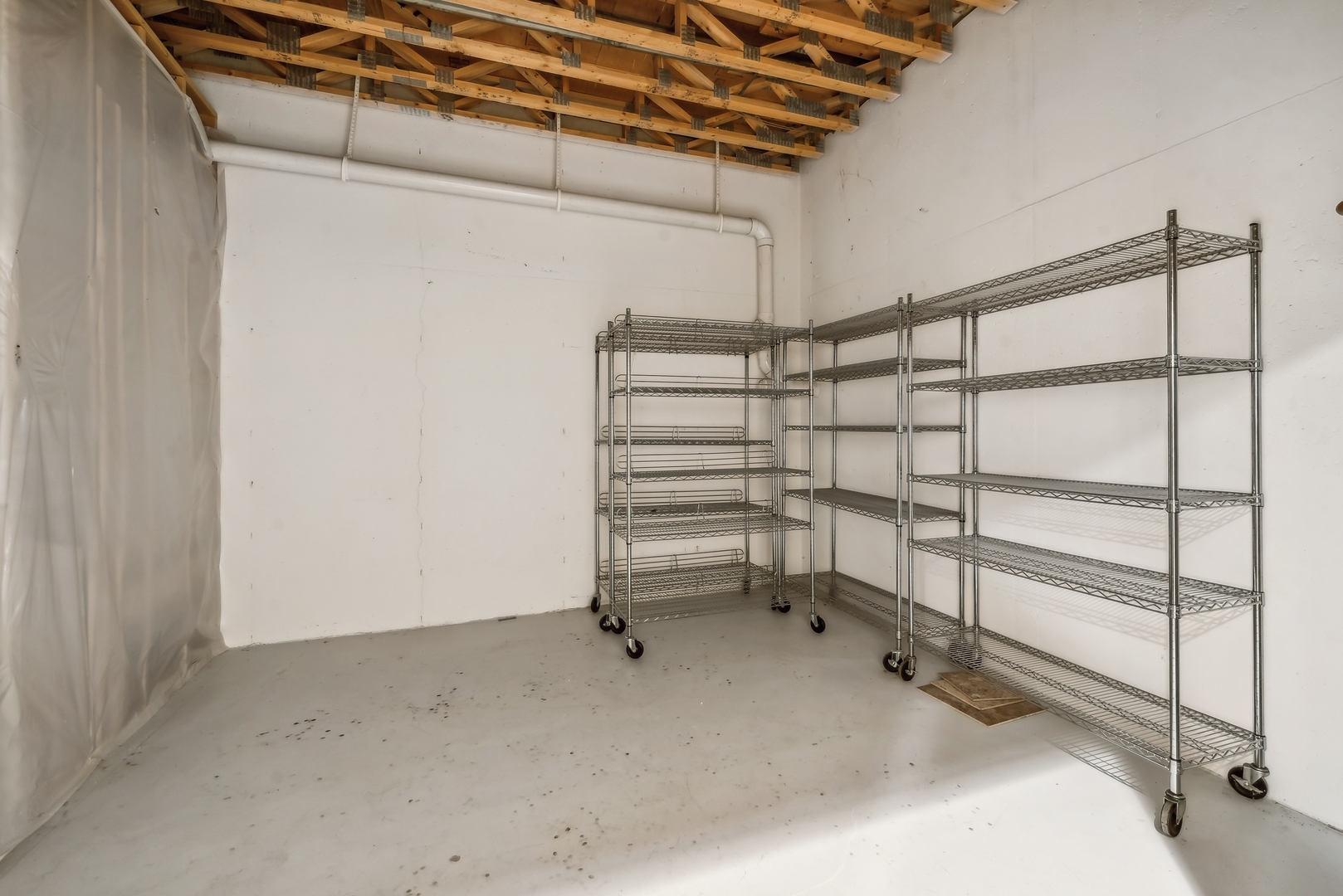 9 Willowcrest Drive, Unit 9 Oak Brook, IL 60523 - Photo 31 of 37 a view of a room with racks on the wall