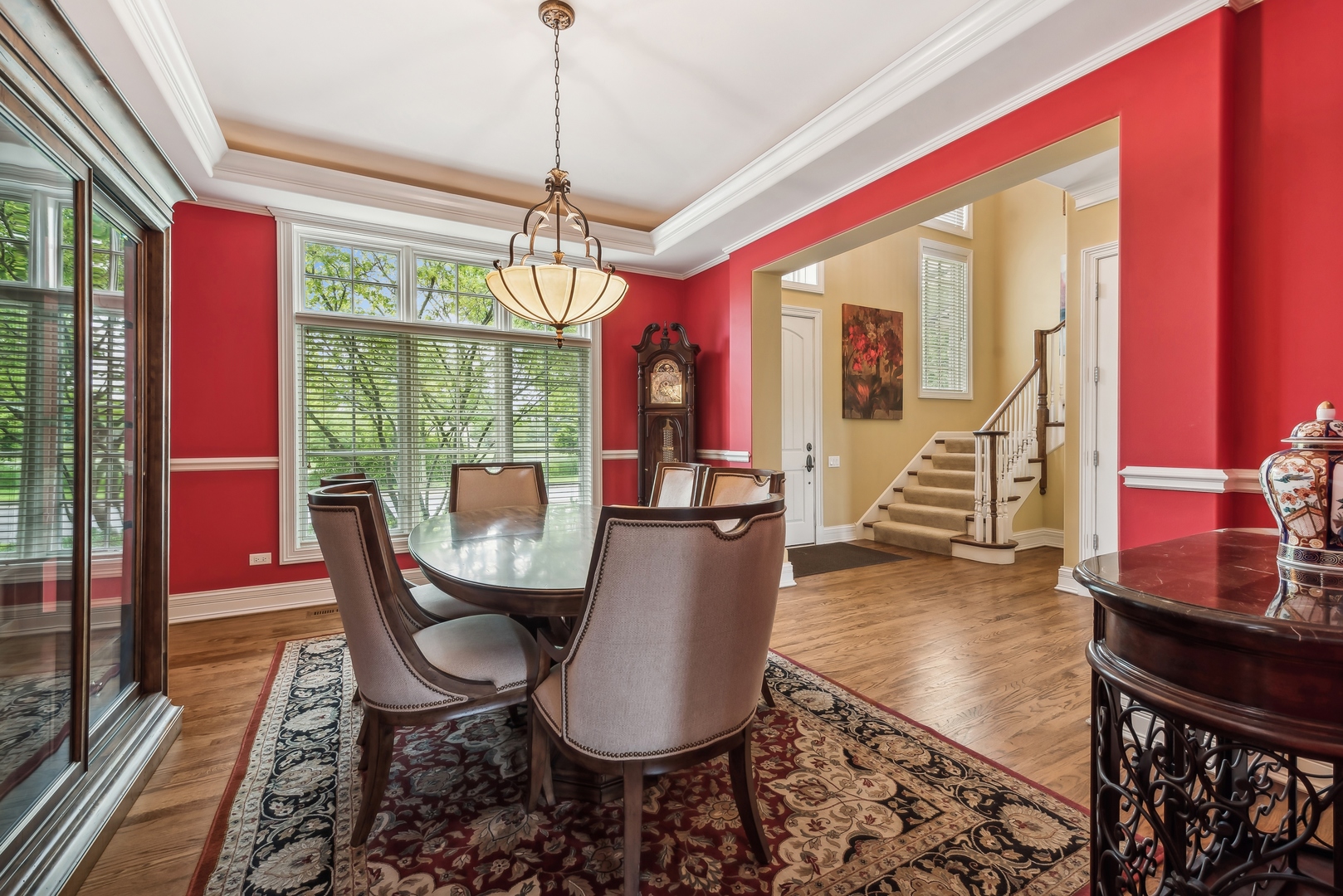 9 Willowcrest Drive, Unit 9 Oak Brook, IL 60523 - Photo 4 of 37 a view of a dining room with furniture window and wooden floor