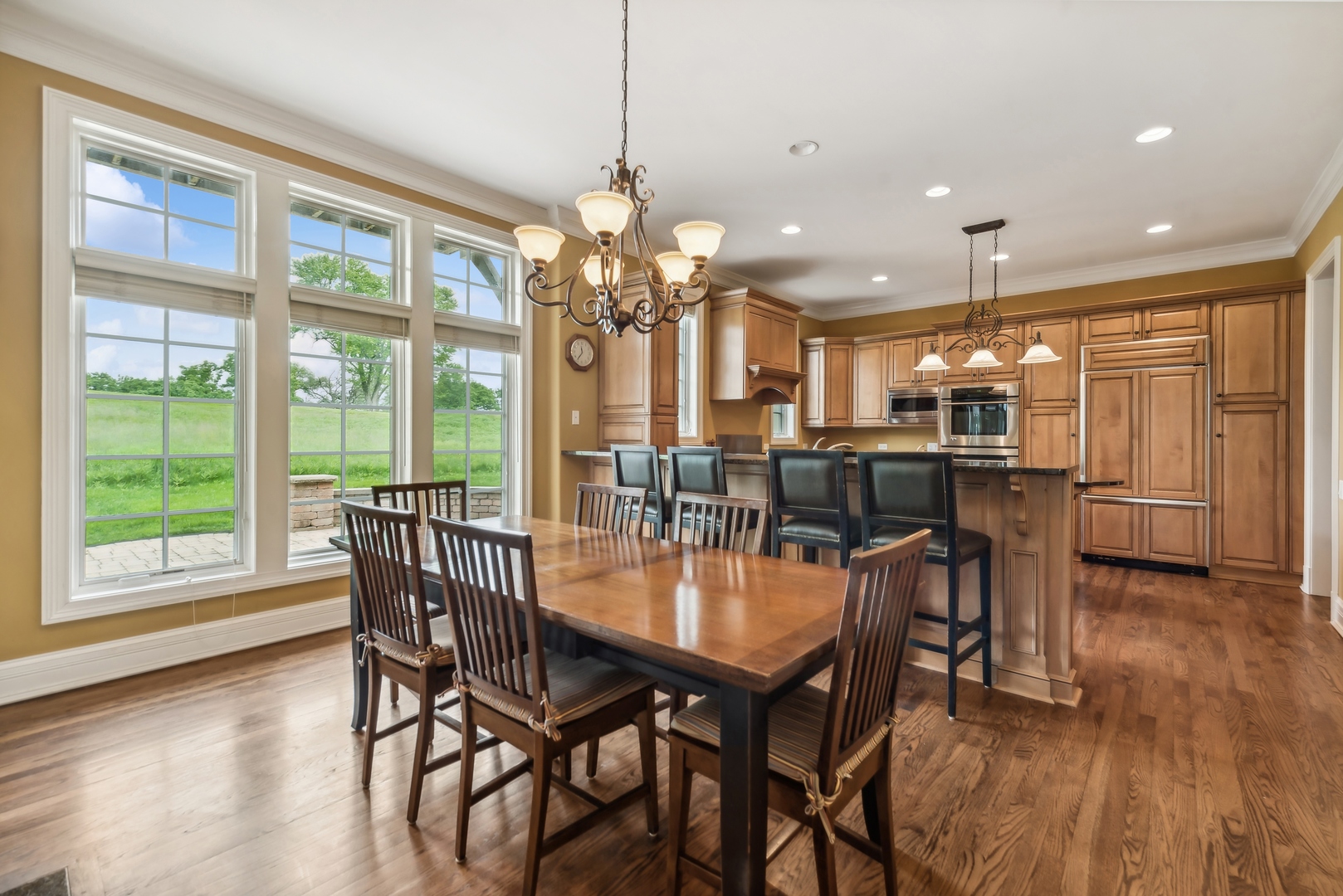 9 Willowcrest Drive, Unit 9 Oak Brook, IL 60523 - Photo 9 of 37 a dining room with furniture window wooden floor