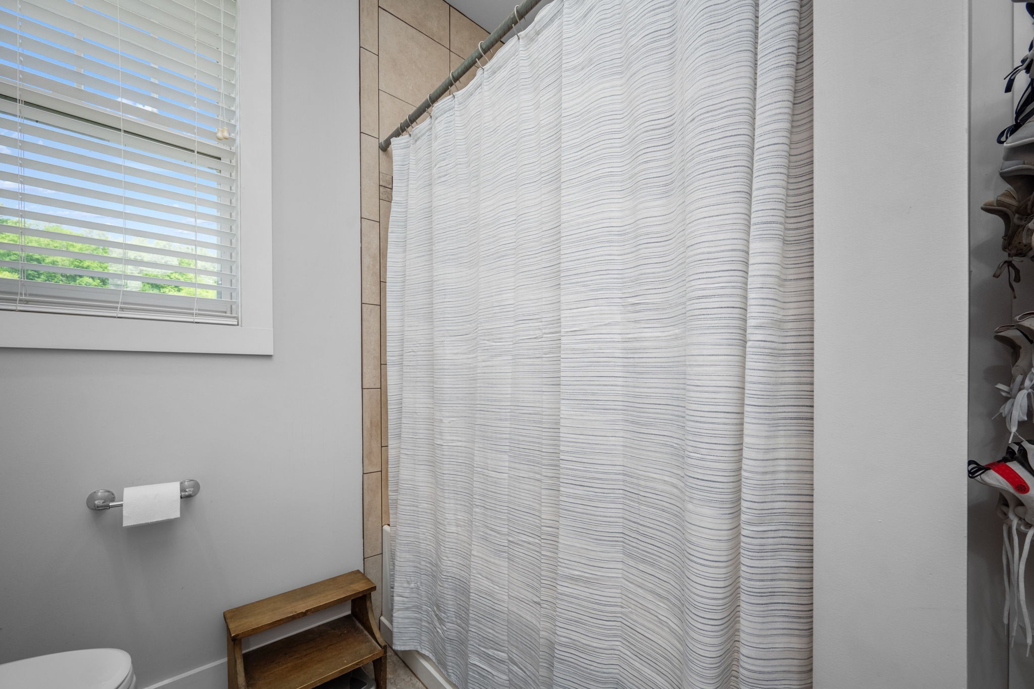 50 Bill Edde Road Belvidere, TN 37306 - Photo 42 of 63 a bathroom with a shower curtain