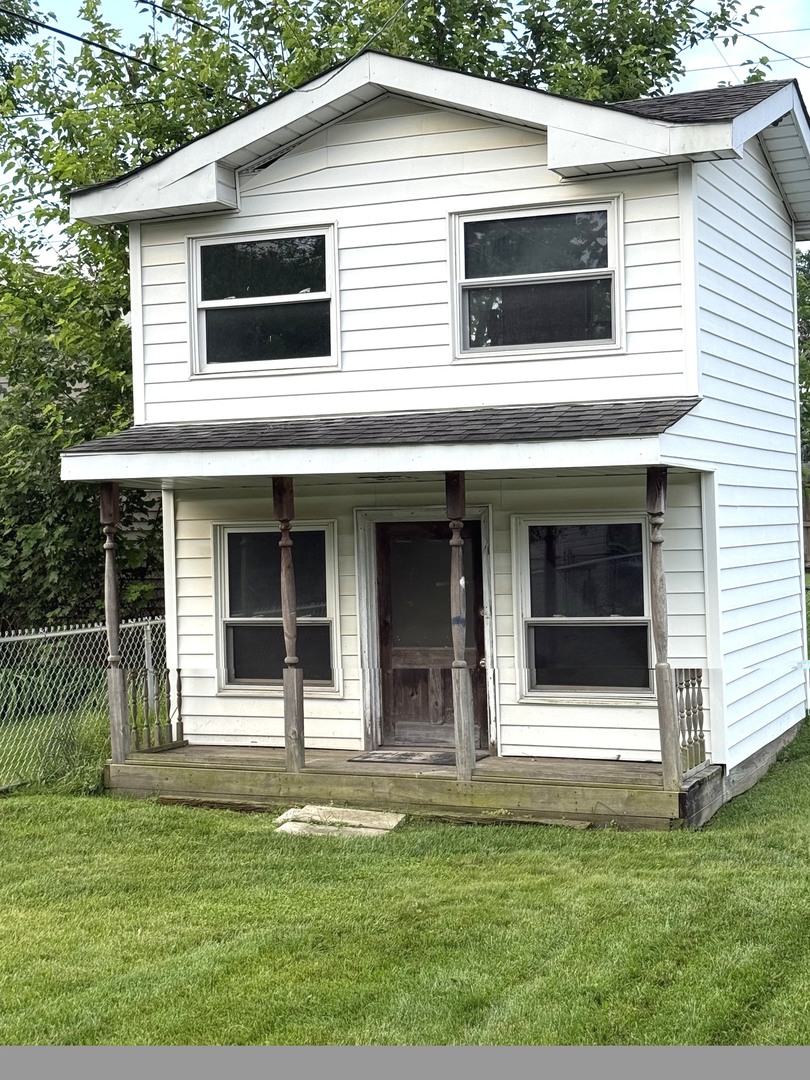 5199 Elmwood Road Oak Forest, IL 60452 - Photo 28 of 30 a front view of a house with a yard