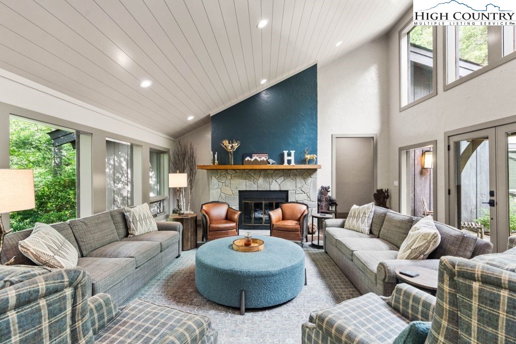 1325 Golf Course Road Linville, NC 28646 - Photo 12 of 46 a living room with furniture and a fireplace