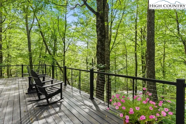a view of a chairs and table on the wooden floor