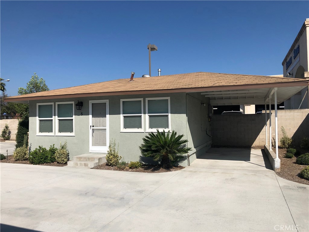 520 West Rte 66, Unit 5 Glendora, CA 91740 - Photo 1 of 5 a front view of a house with a yard