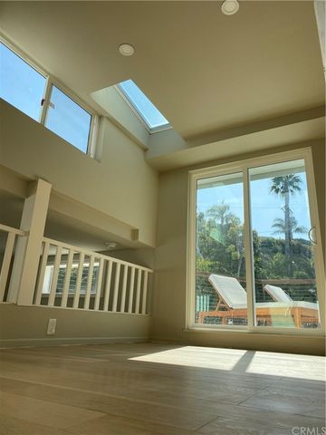 a view of balcony with a floor to ceiling window and a floor to ceiling window