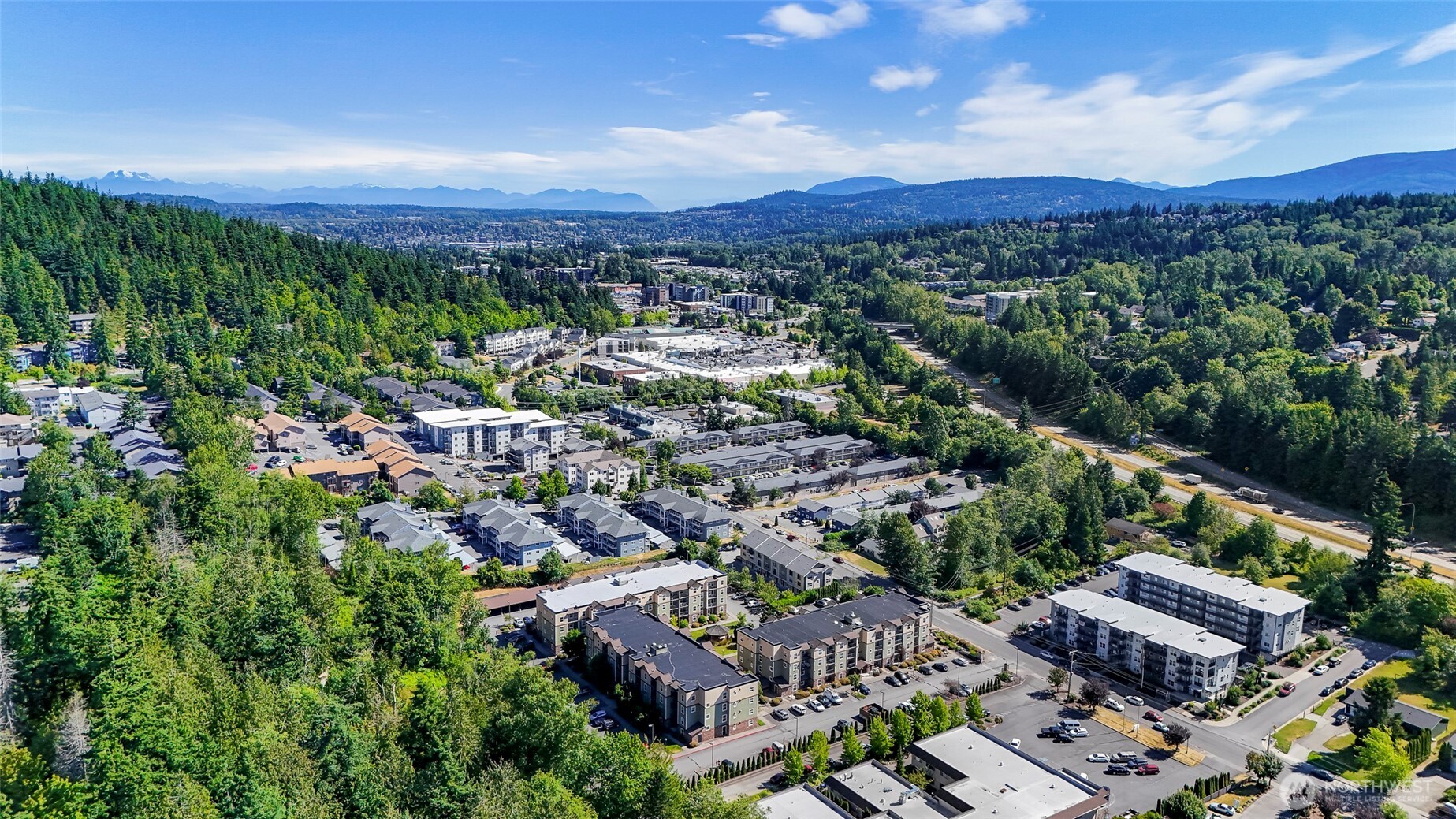 700 32nd Street, Unit A309 Bellingham, WA 98225 - Photo 1 of 28 an aerial view of residential houses with outdoor space and street view
