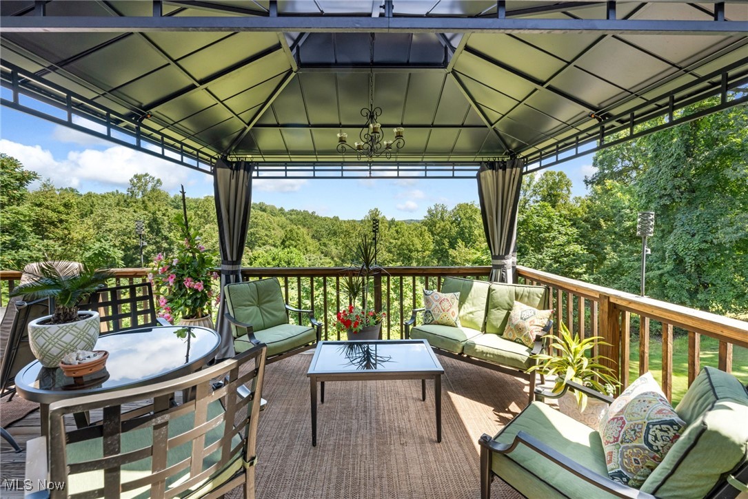 1623 Carson Road New Cumberland, WV 26047 - Photo 15 of 40 Deck featuring a gazebo and an outdoor hangout area
