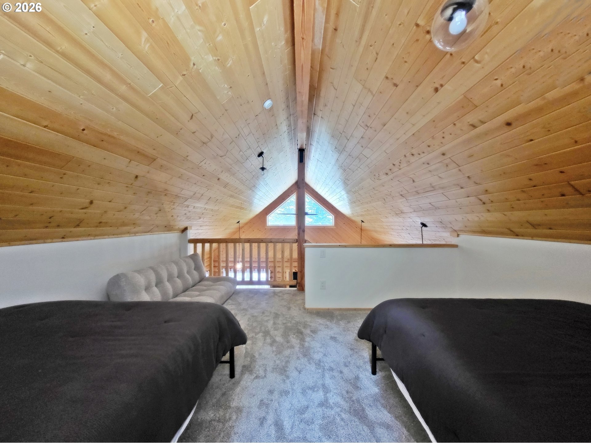 84730 Talmena Road Wallowa Lake, OR 97846 - Photo 17 of 25 a bedroom with a bed and a window