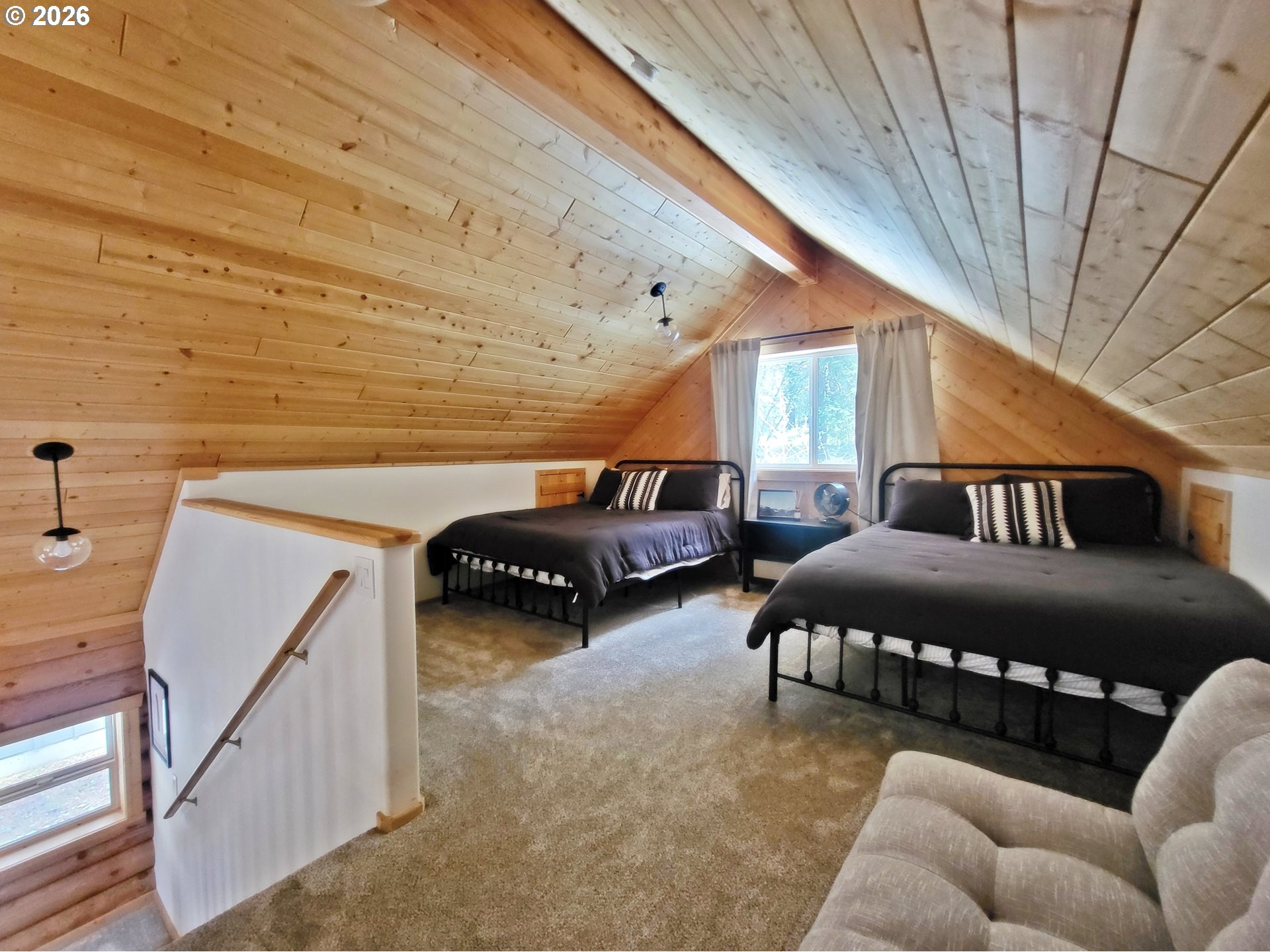 84730 Talmena Road Wallowa Lake, OR 97846 - Photo 18 of 25 a view of a livingroom with furniture and staircase