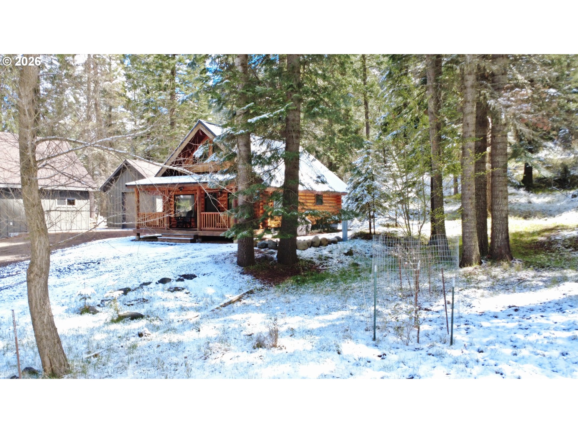 84730 Talmena Road Wallowa Lake, OR 97846 - Photo 2 of 25 a view of a house with a yard