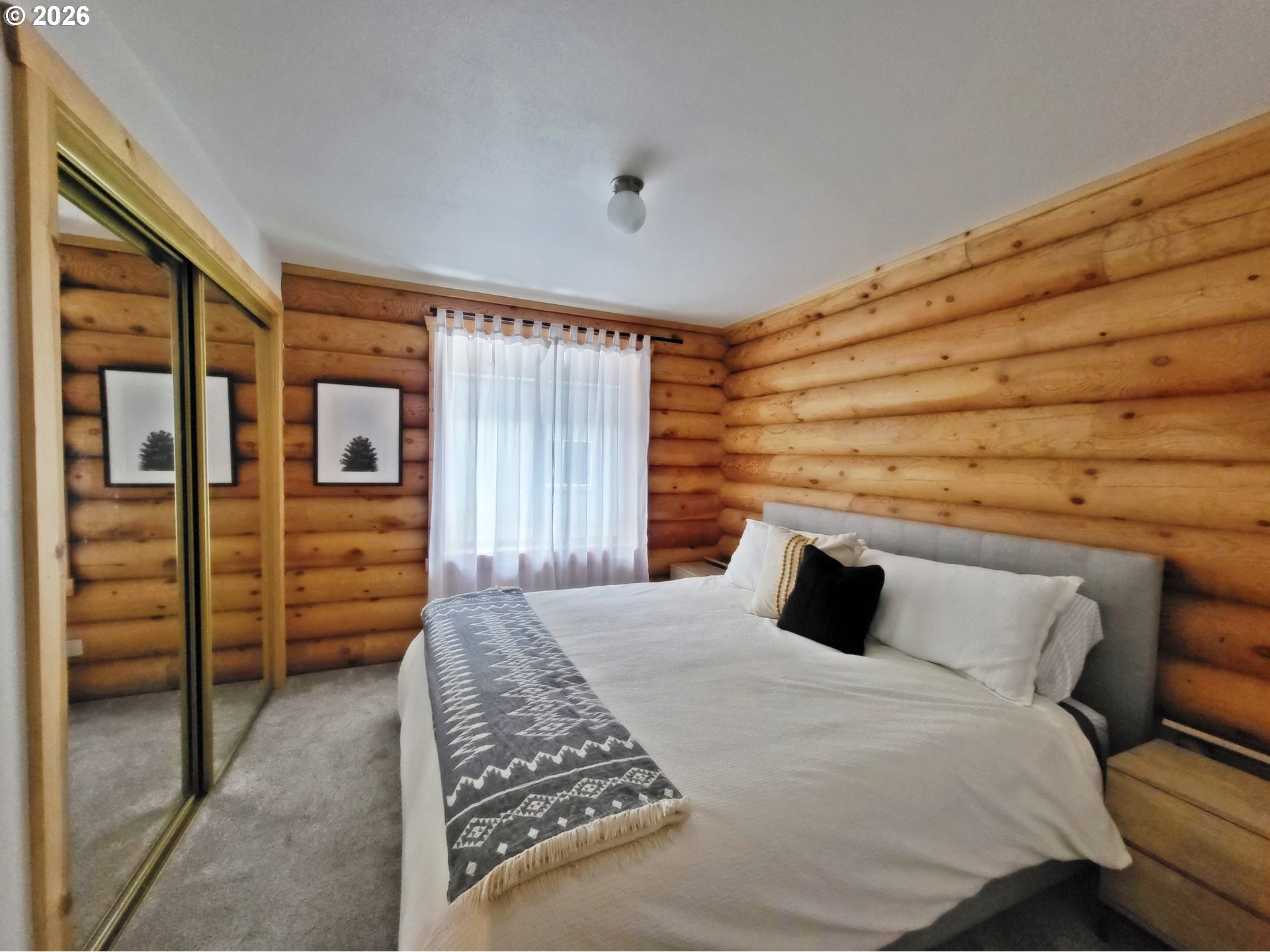 84730 Talmena Road Wallowa Lake, OR 97846 - Photo 22 of 25 a bedroom with a bed and walk in closet