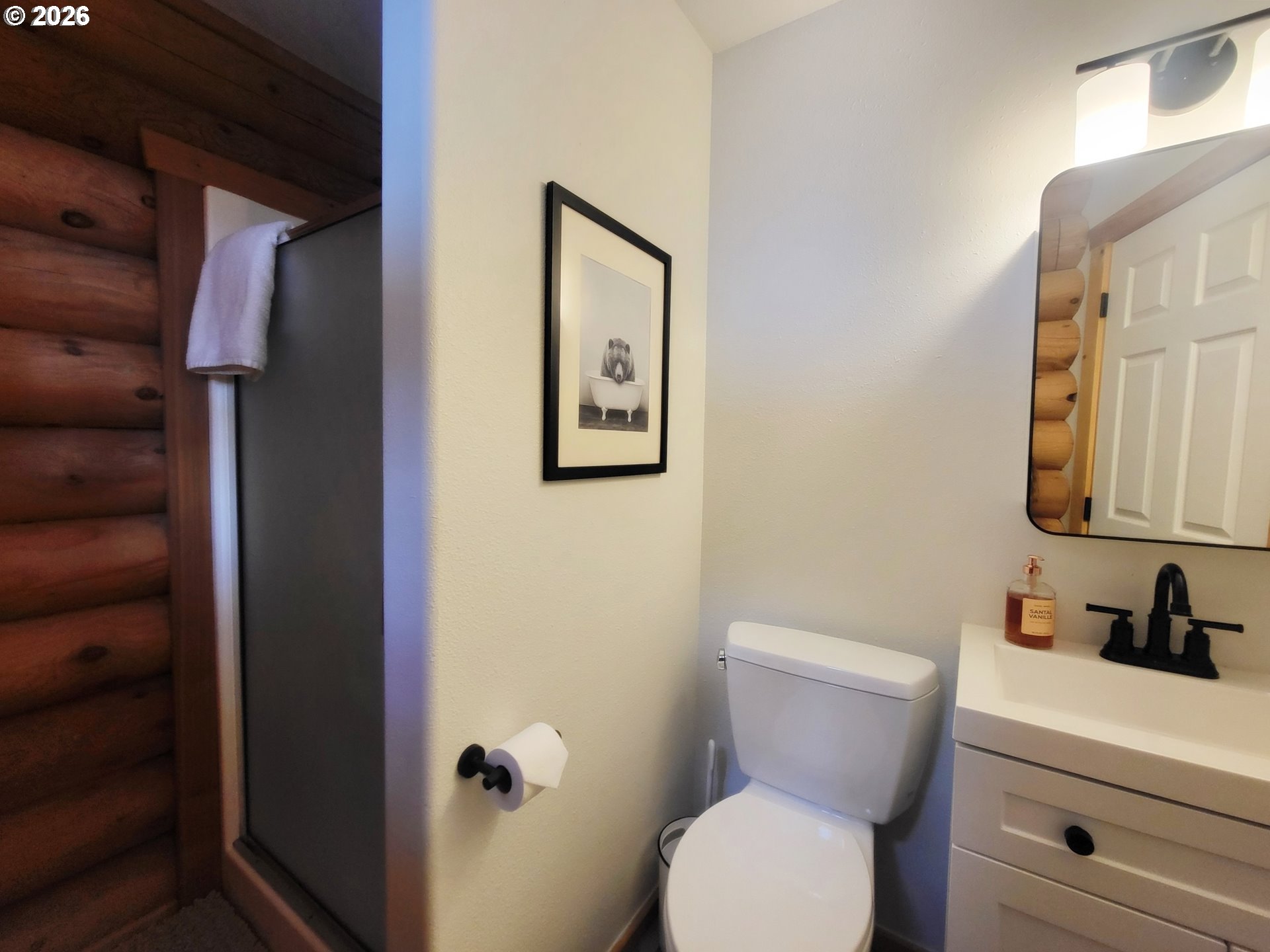 84730 Talmena Road Wallowa Lake, OR 97846 - Photo 24 of 25 a white toilet sitting next to a bathroom sink