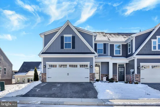 a view of a house with a sink and yard