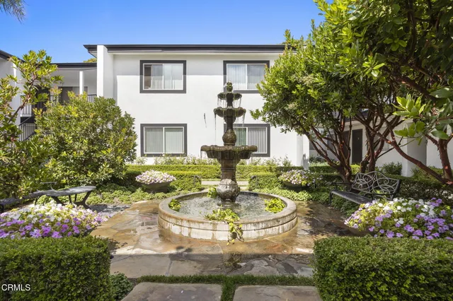 a house view with a garden space
