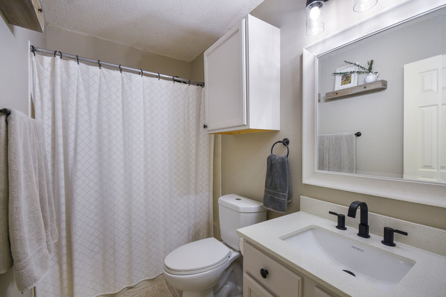 1750 Star Light Circle Cedar Park, TX 78613 - Photo 26 of 40 a bathroom with a toilet sink and mirror