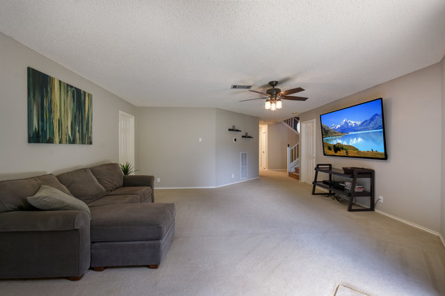 1750 Star Light Circle Cedar Park, TX 78613 - Photo 30 of 40 a living room with furniture and a flat screen tv