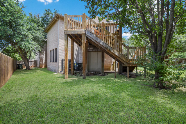 1750 Star Light Circle Cedar Park, TX 78613 - Photo 34 of 40 a view of a house with a yard and wooden fence